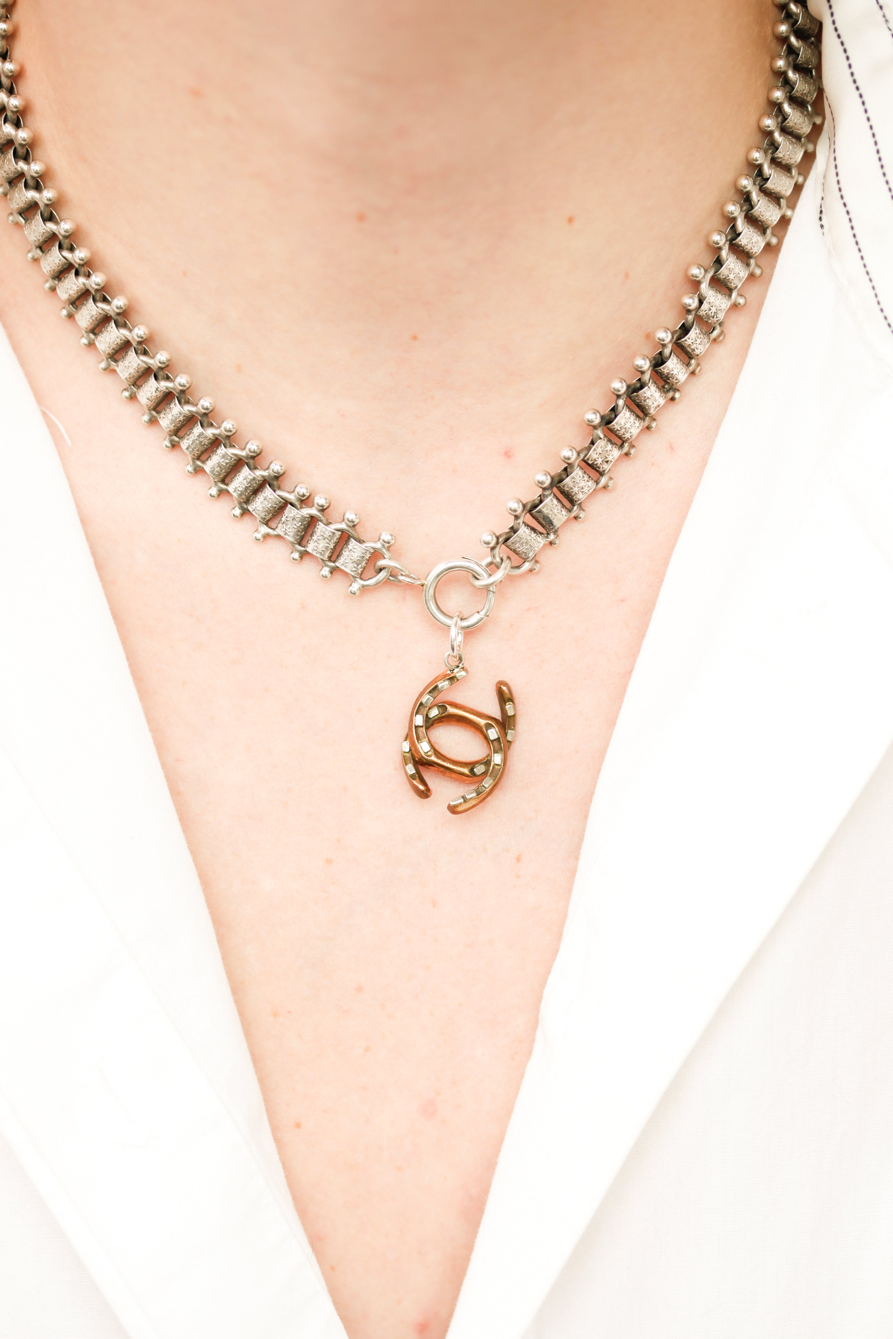 Double Horseshoe Charm