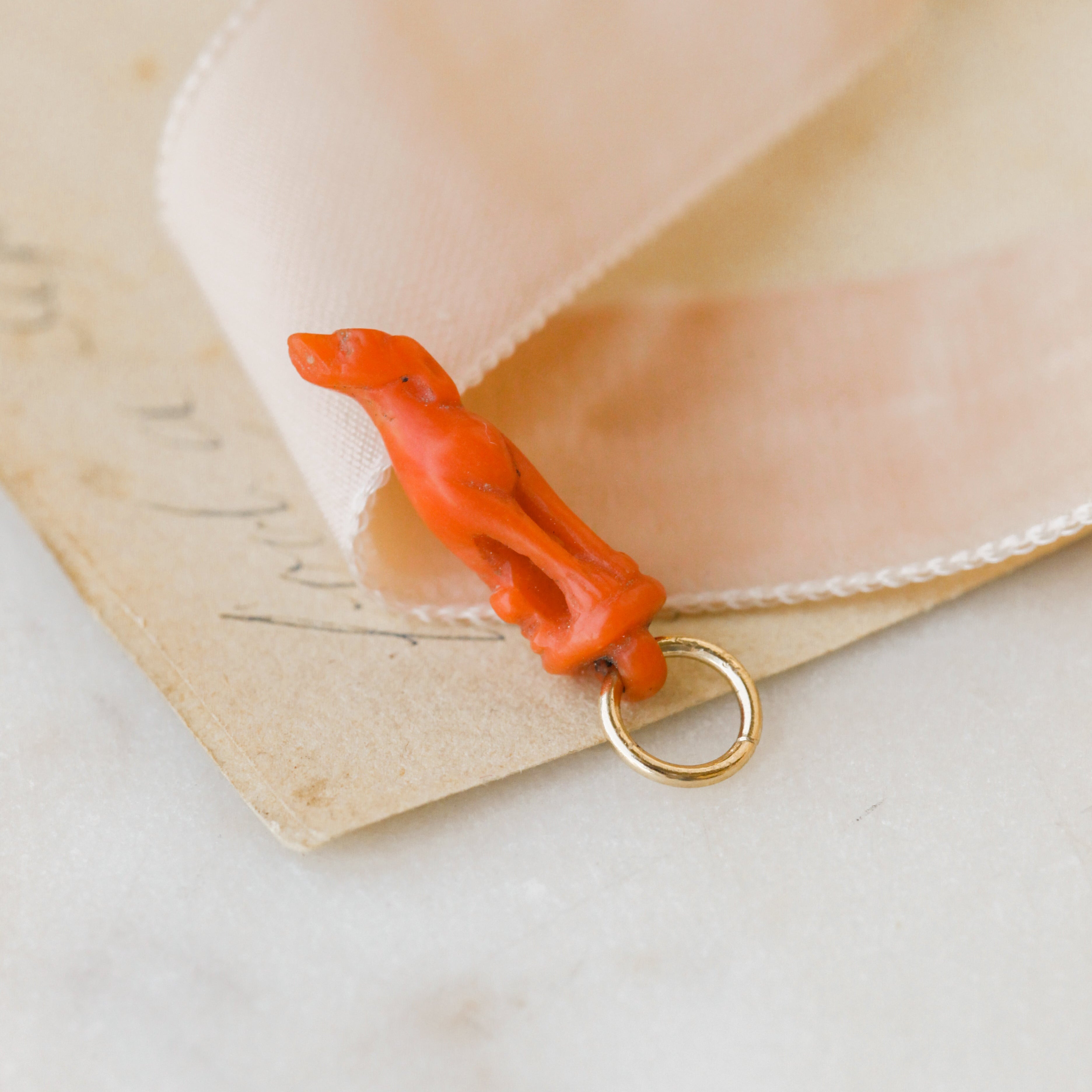 Carved Coral Hound
