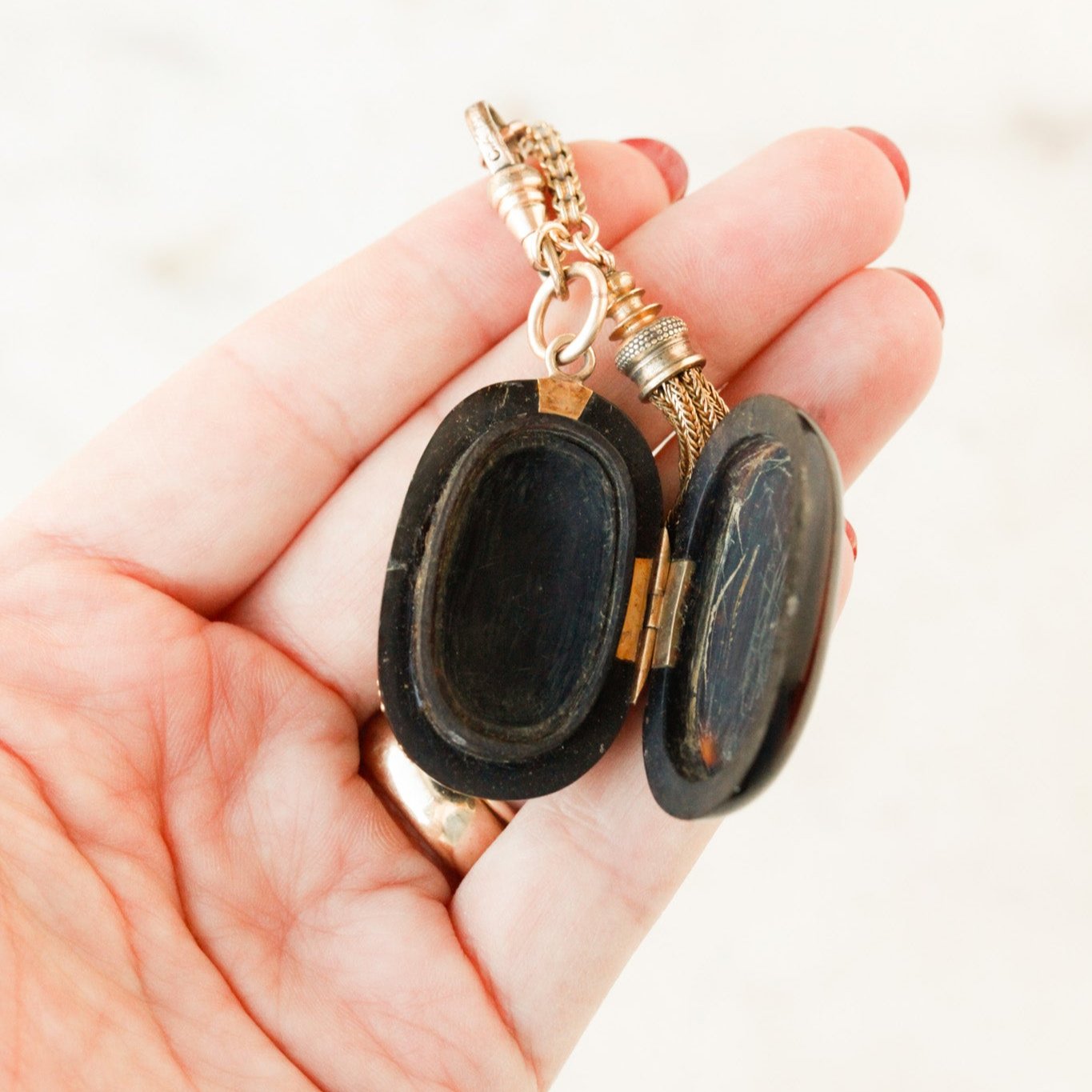 Pique Tortoiseshell Tasseled Locket