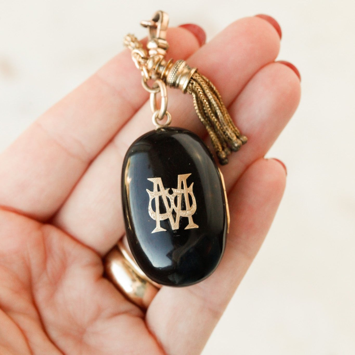Pique Tortoiseshell Tasseled Locket