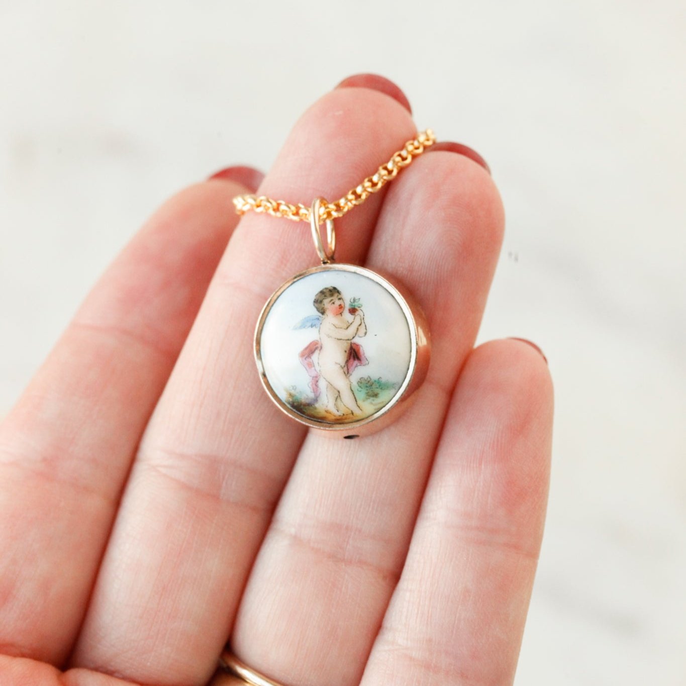 Enameled Cherub Pendant