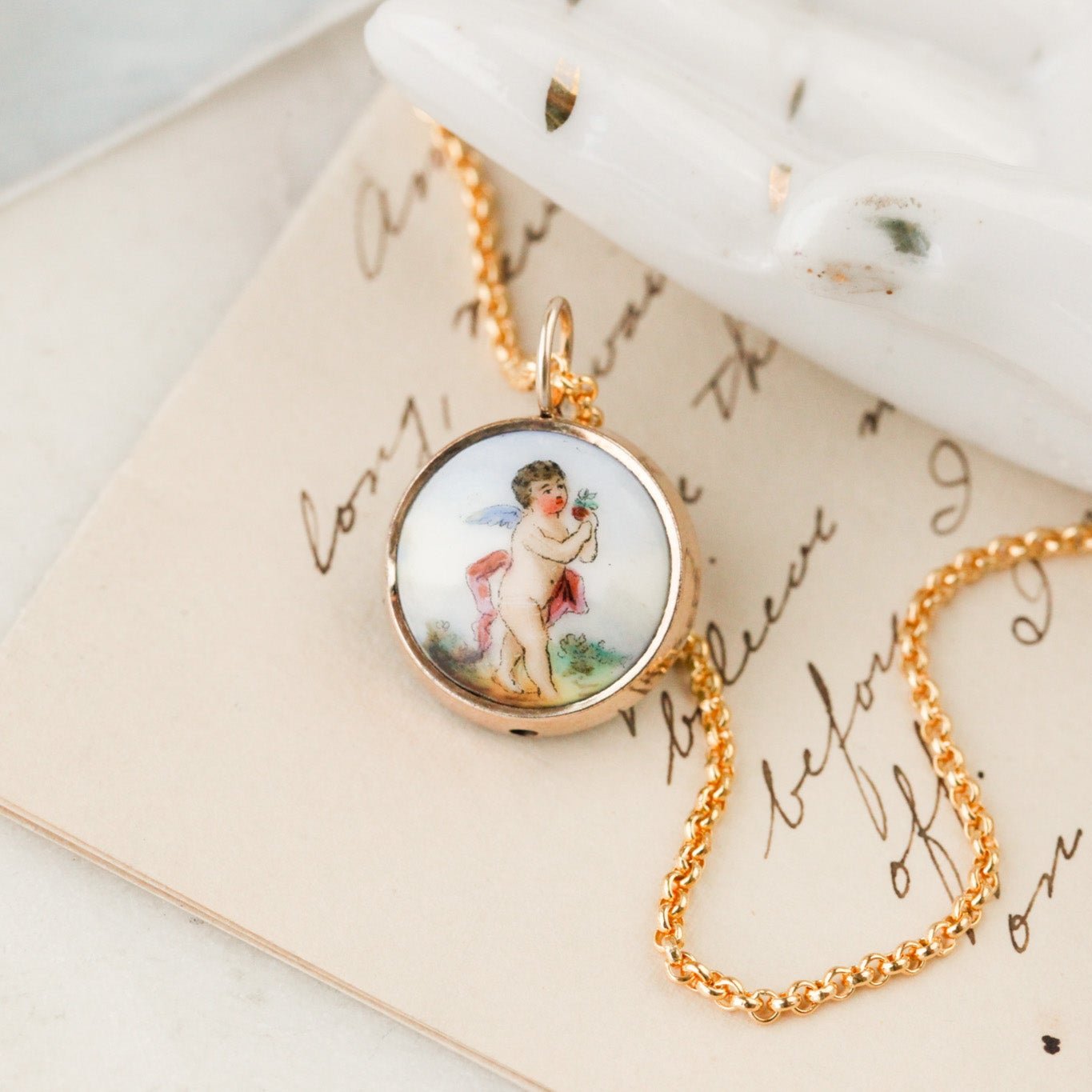 Enameled Cherub Pendant