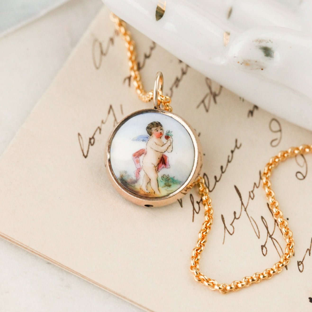 Enameled Cherub Pendant