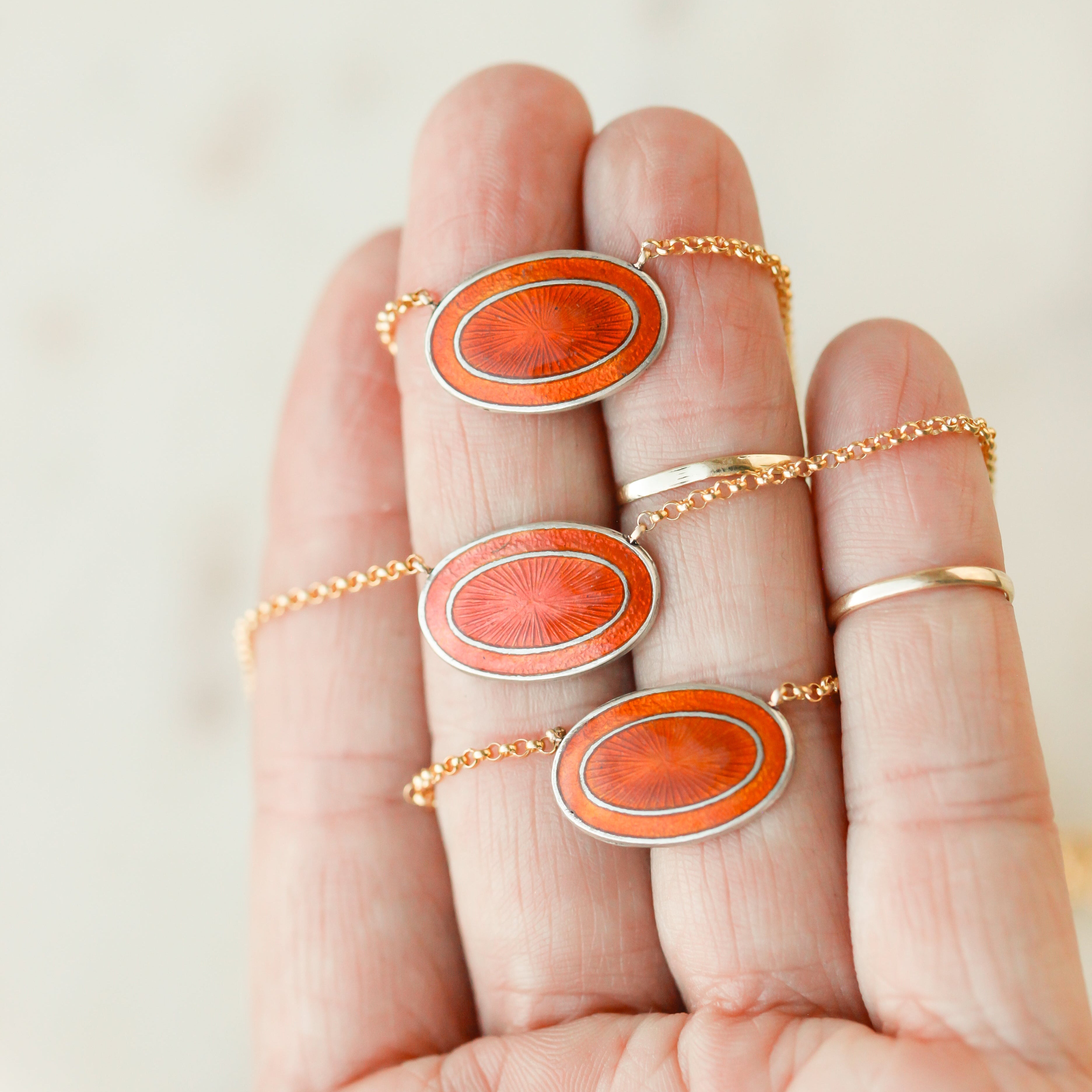 Orange Enameled Pendants