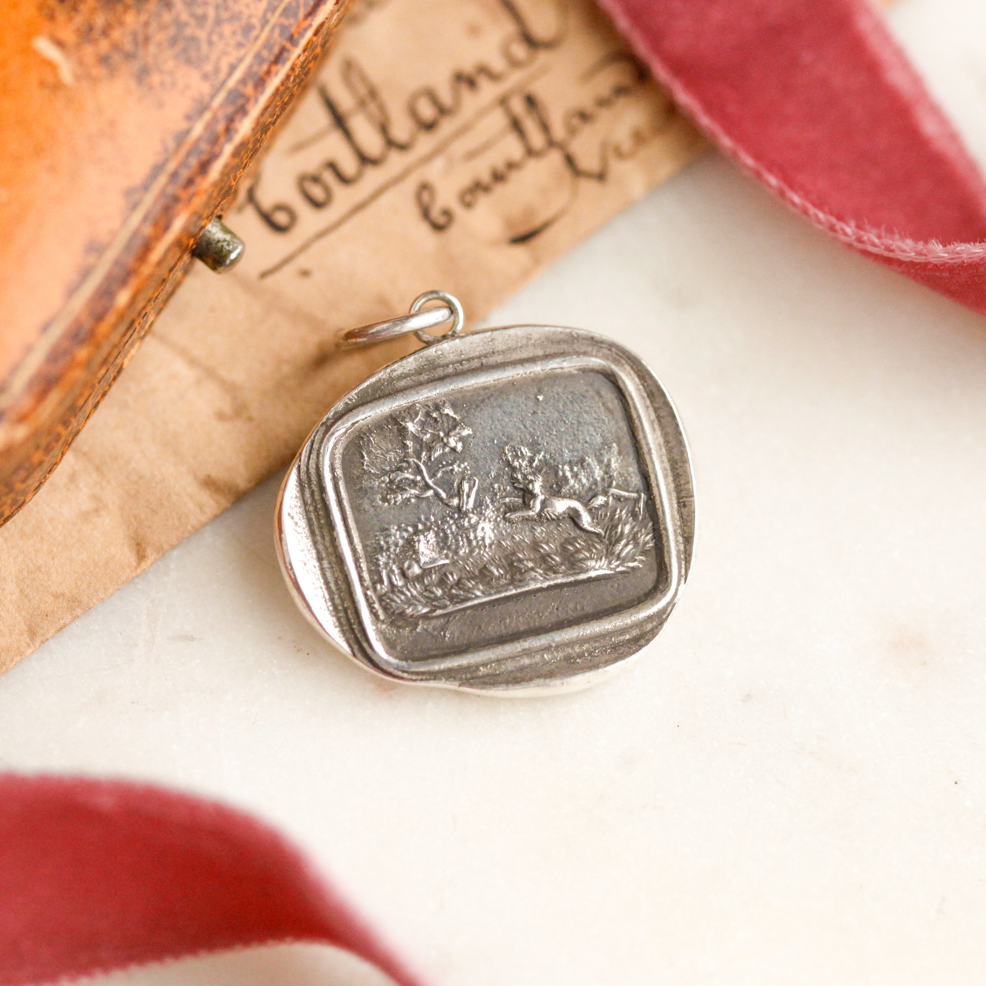 "Fair Game" Silver Charm