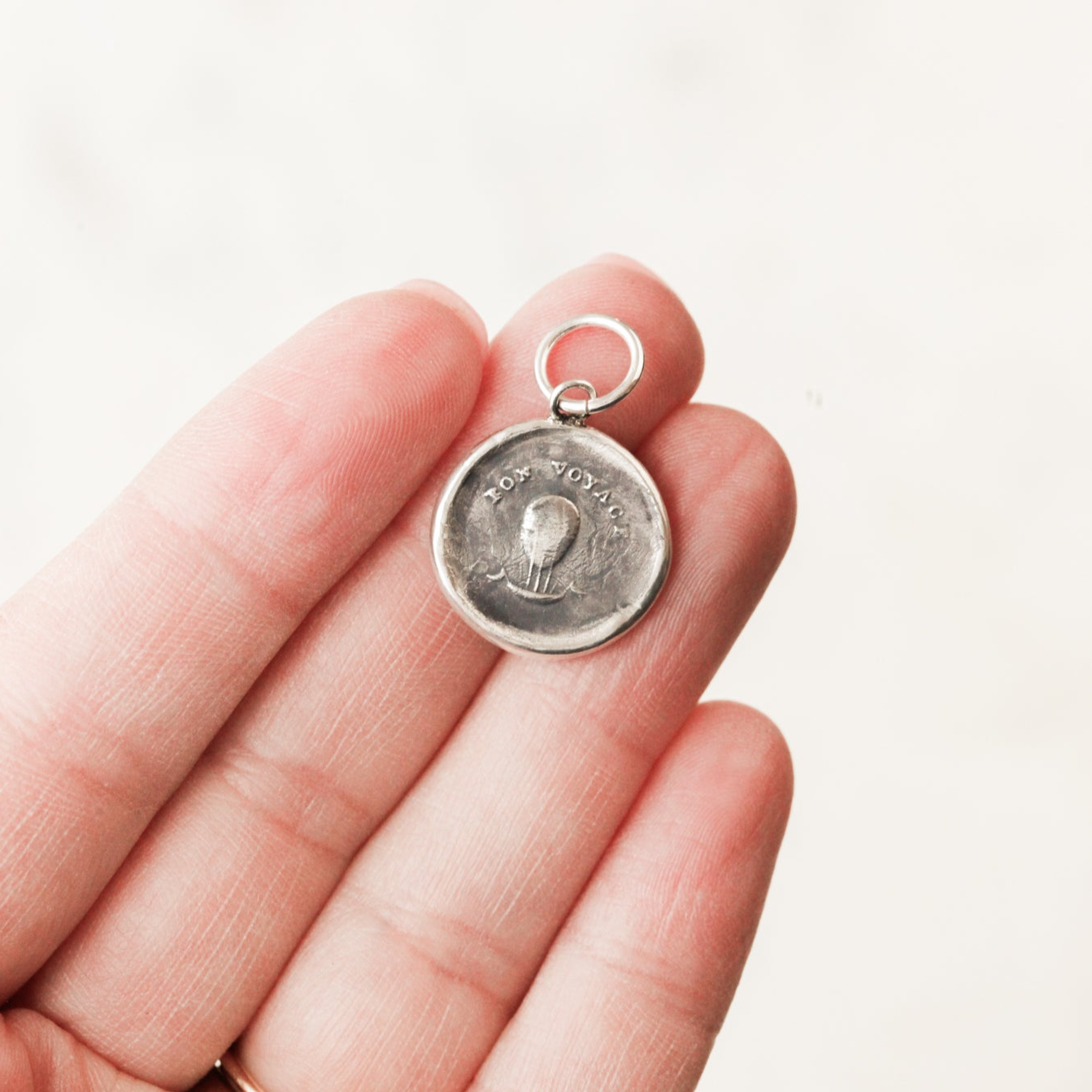 "Bon Voyage" Silver Charm
