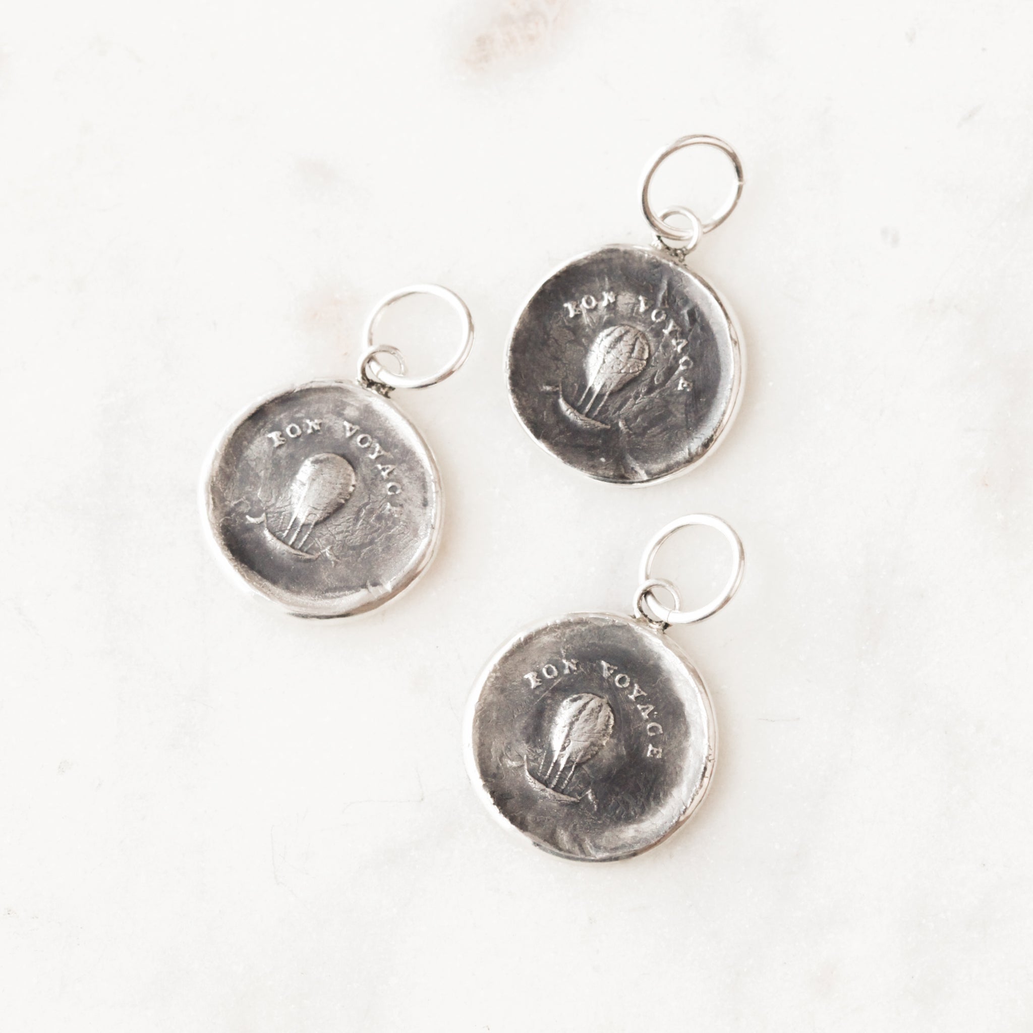 "Bon Voyage" Silver Charm
