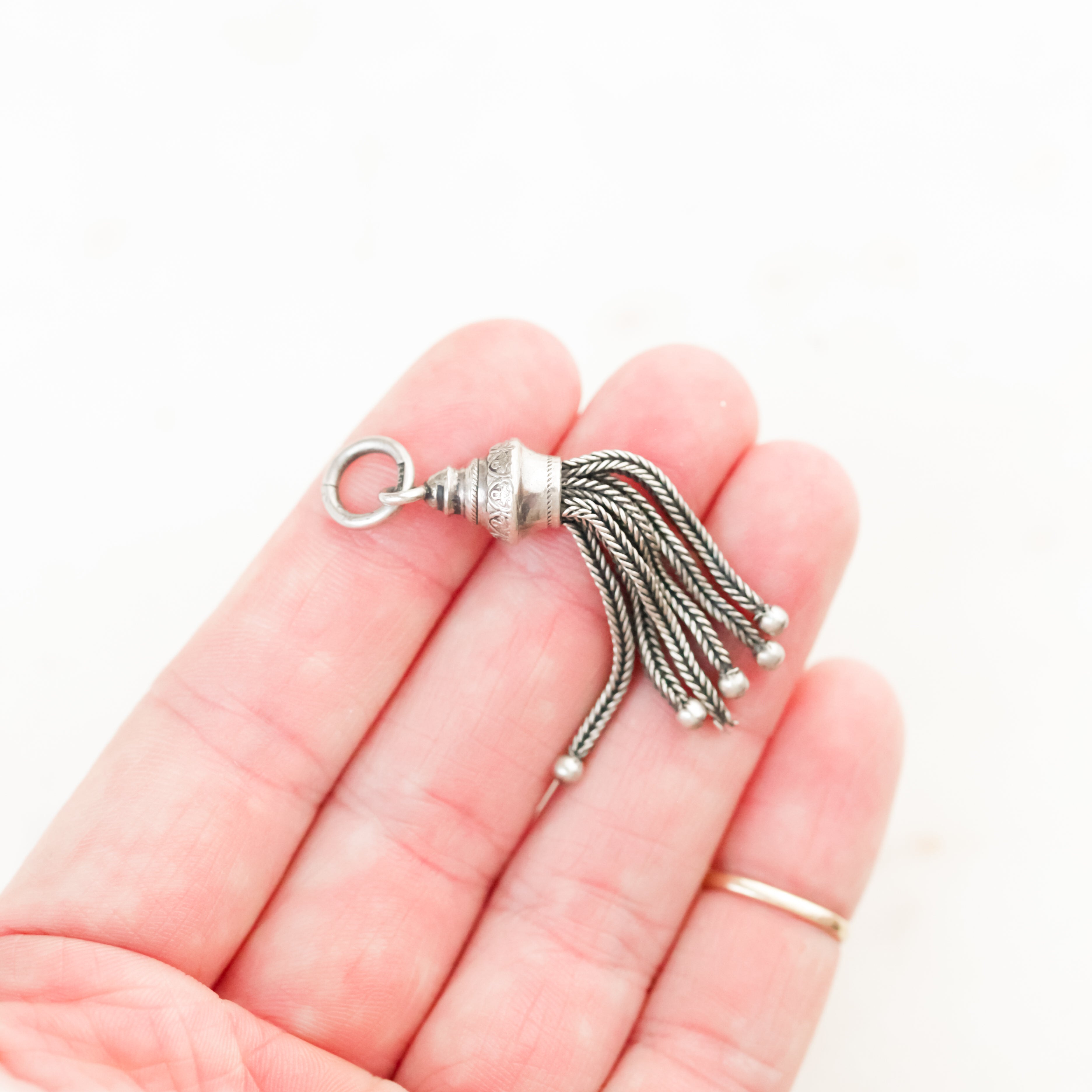 Beret Sterling Tassel Charm