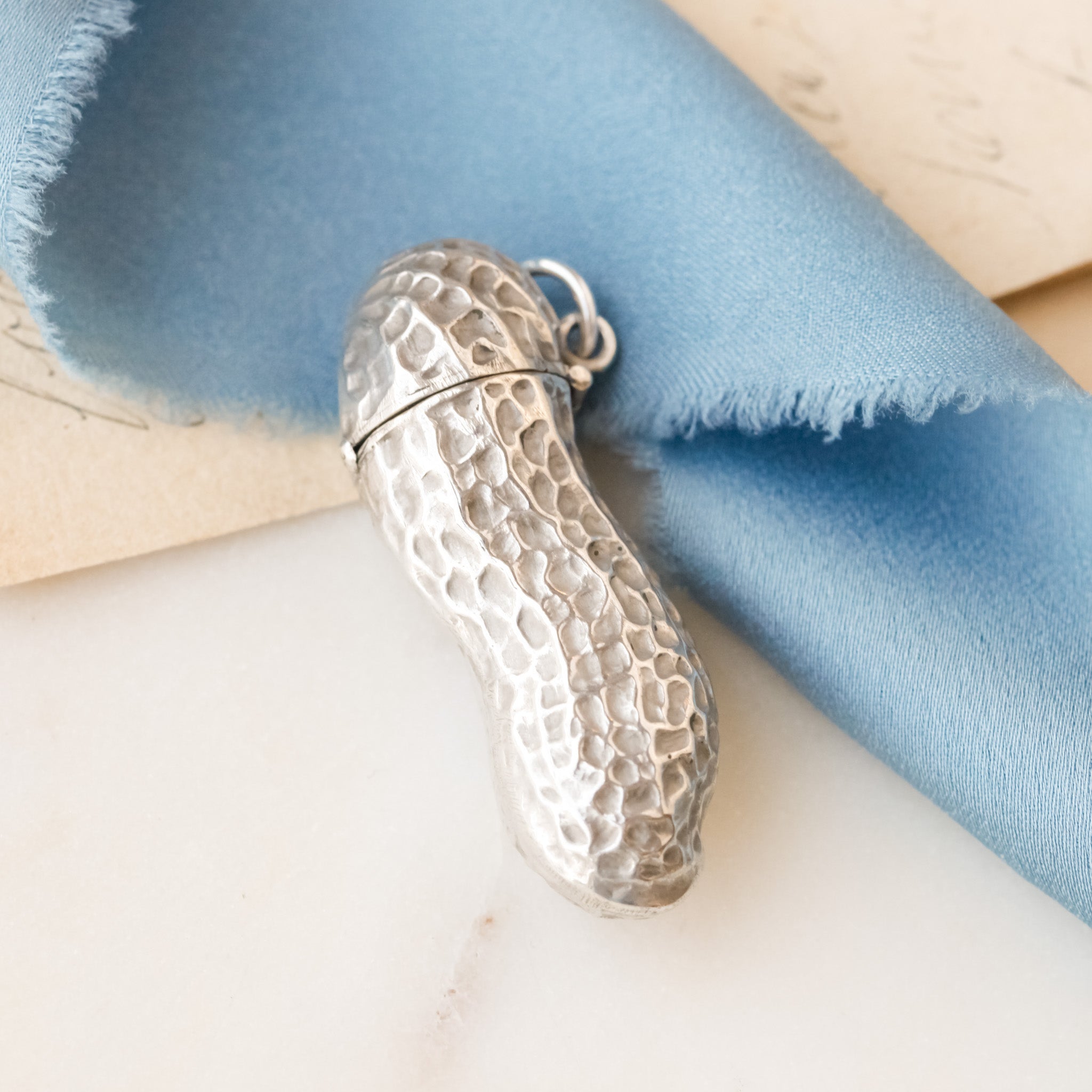 Hidden Peanut Perfume Bottle