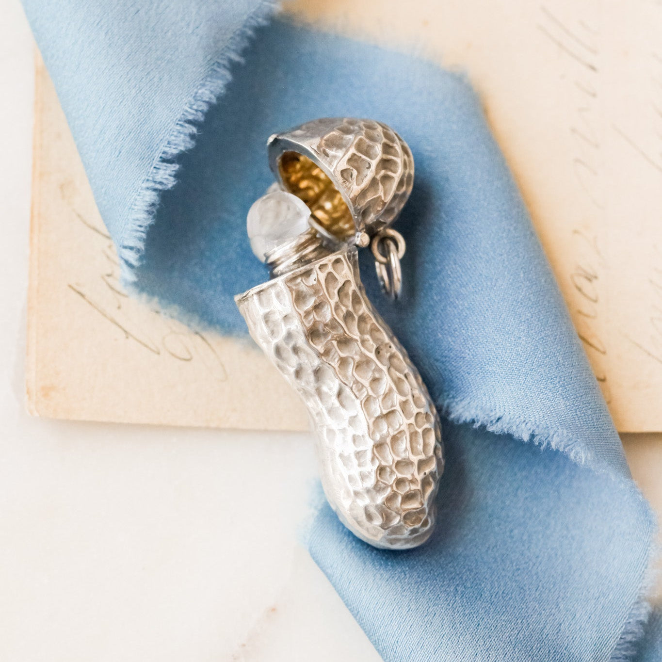 Hidden Peanut Perfume Bottle