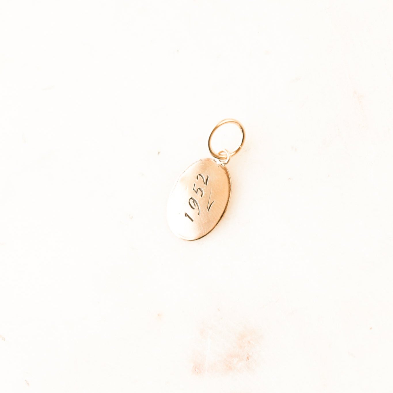 "1952" Oval Charm