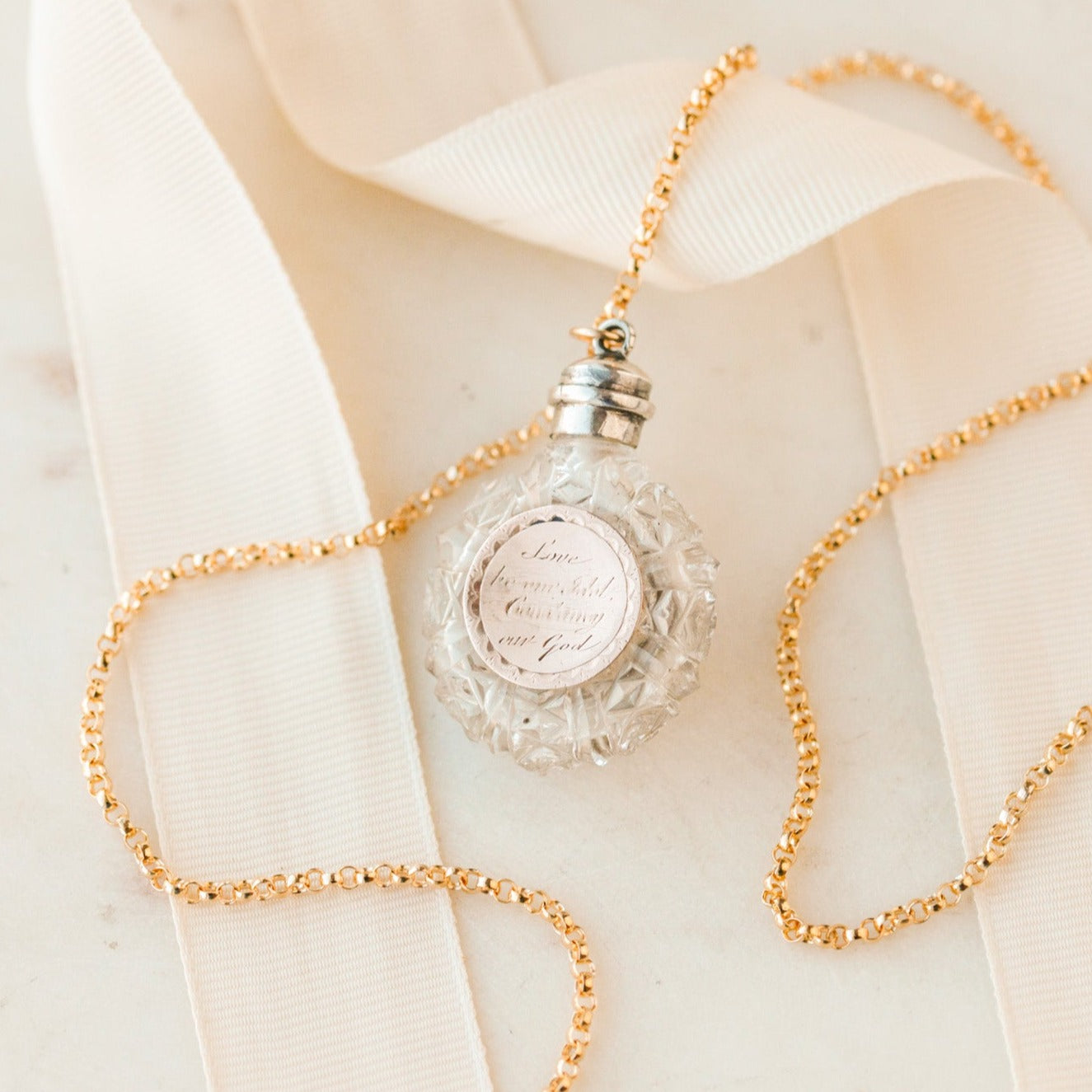 "Love be our Idol" Crystal Bottle Pendant