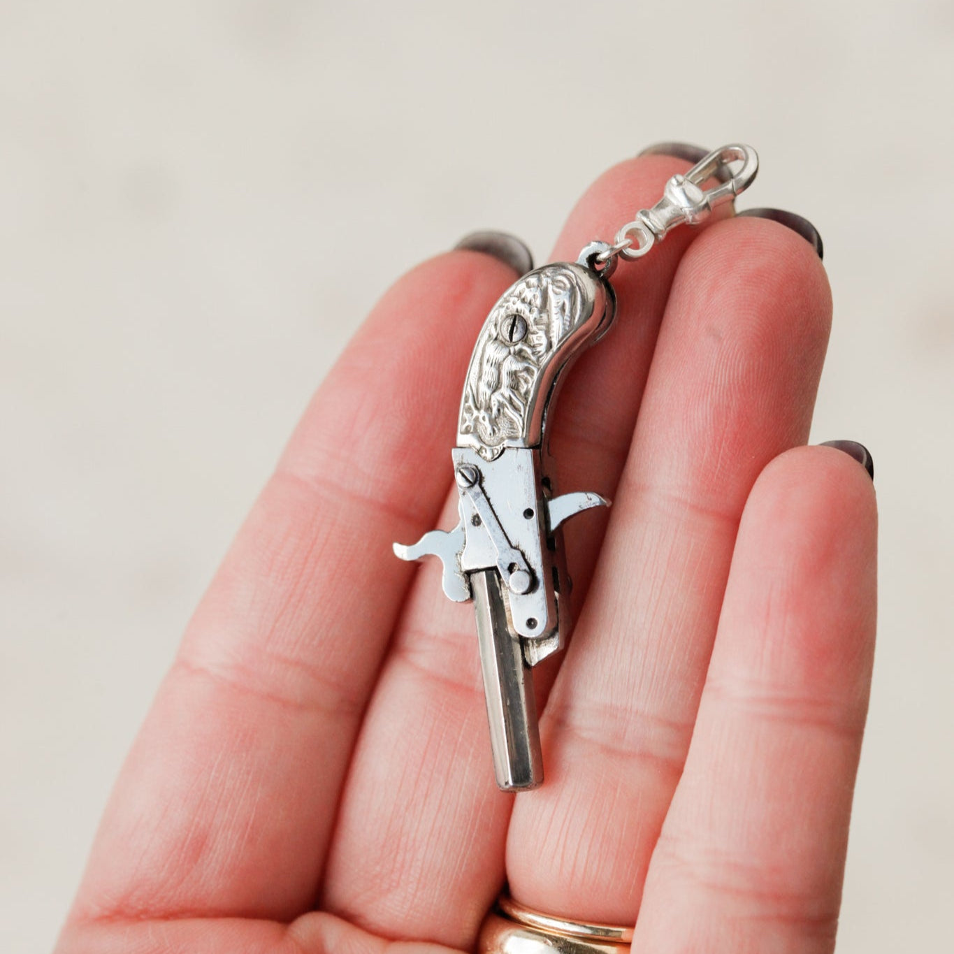 Hunter's Pistol Charm