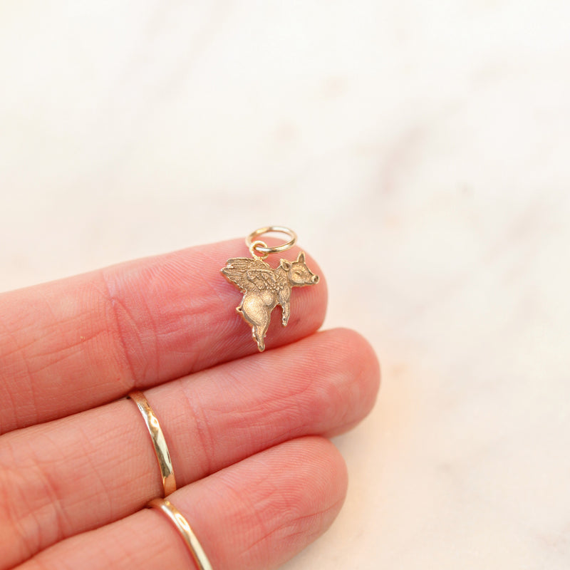 "Impossible Pig" Gold Charm