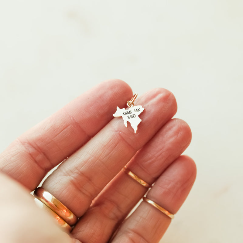 "Impossible Pig" Gold Charm