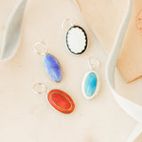 Enameled Cuff Pendants.