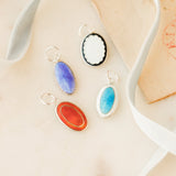 Enameled Cuff Pendants.