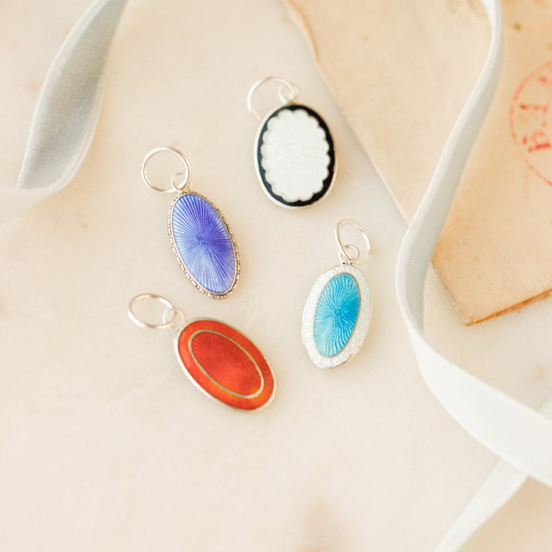 Enameled Cuff Pendants.