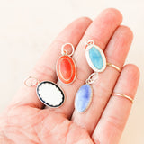 Enameled Cuff Pendants.