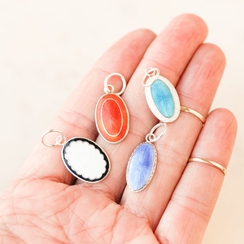 Enameled Cuff Pendants.
