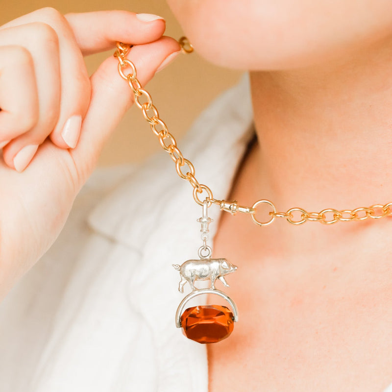 Spinning Pig Pendant