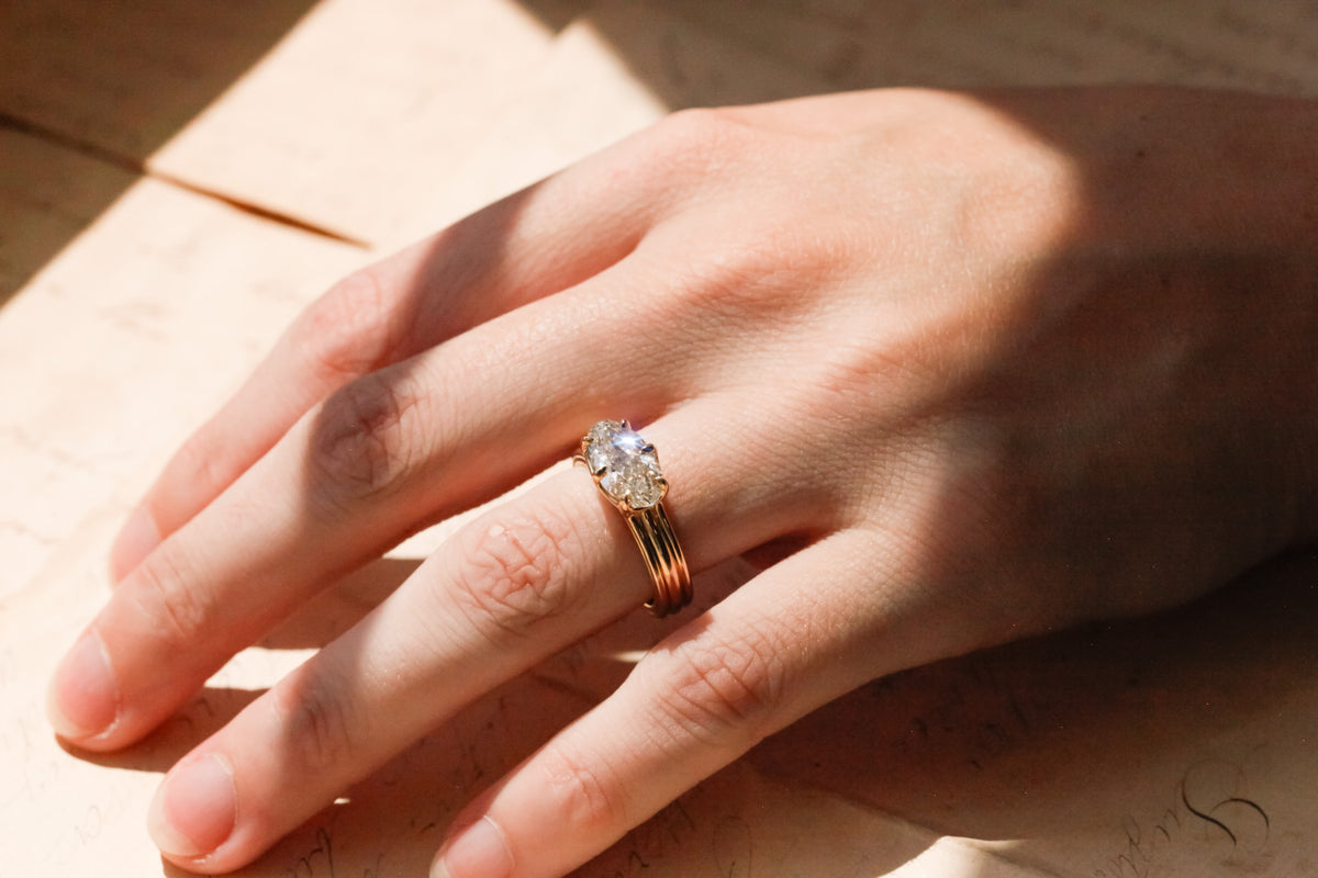 Antique Moval Diamond in Regency Setting