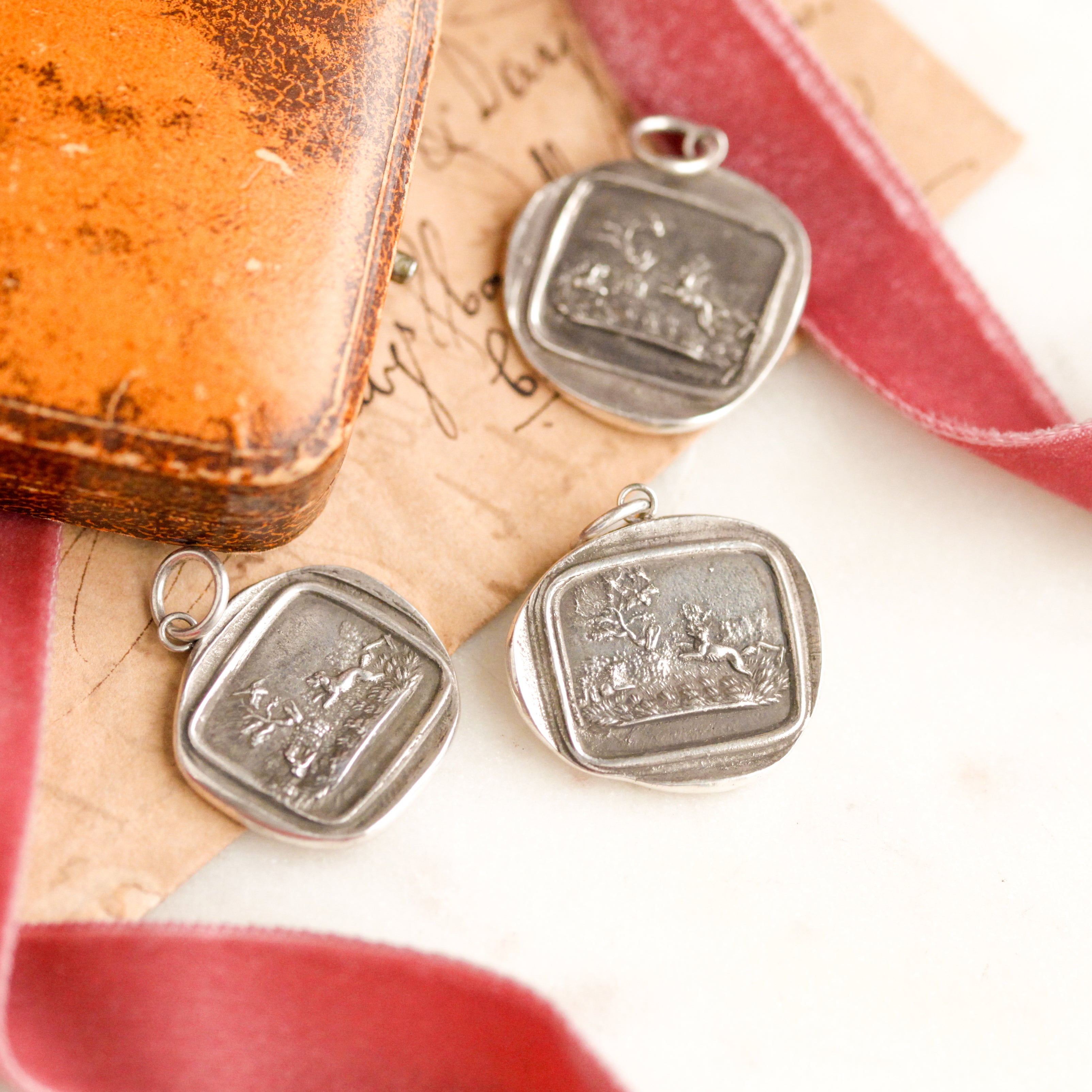 "Fair Game" Silver Charm