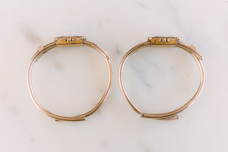 side view of matching gold victorian engagement bracelets