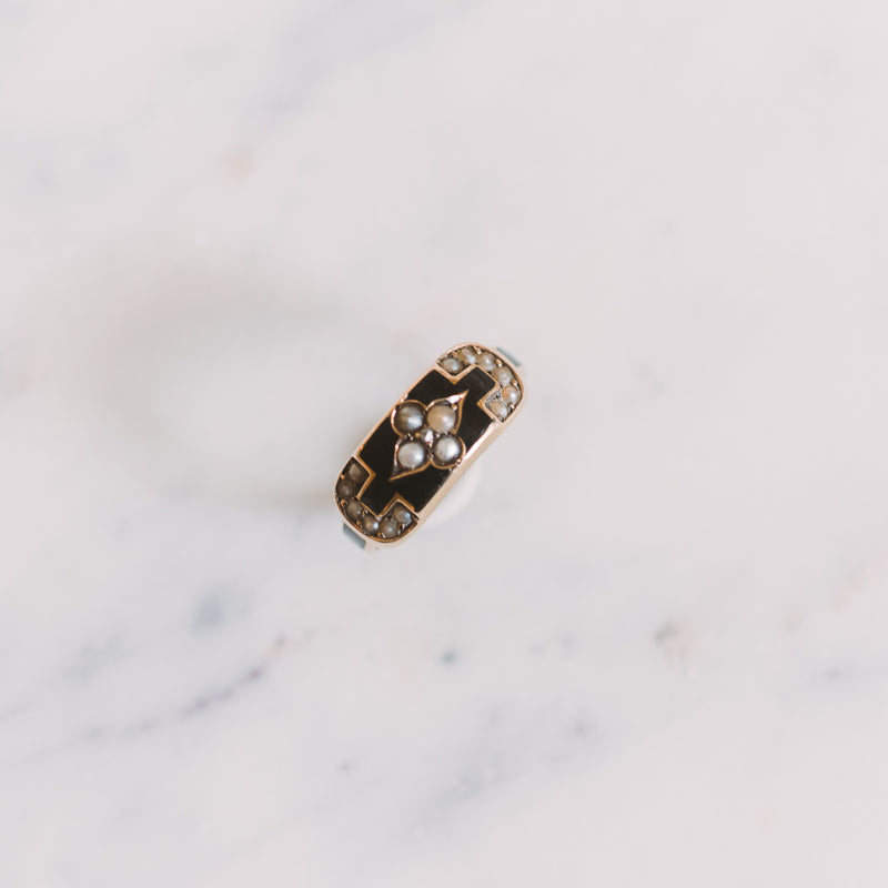gold ring with onyx and pearl details