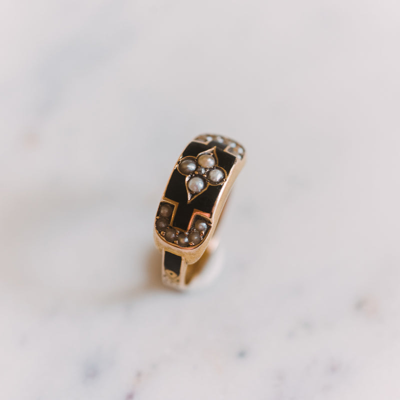 gold ring with onyx and pearl details