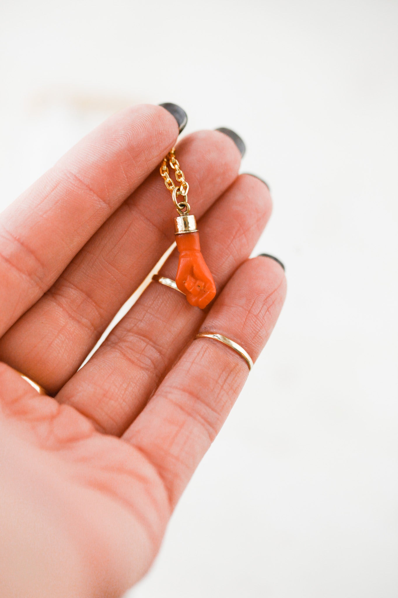 Coral Figa Fist Charm Necklace